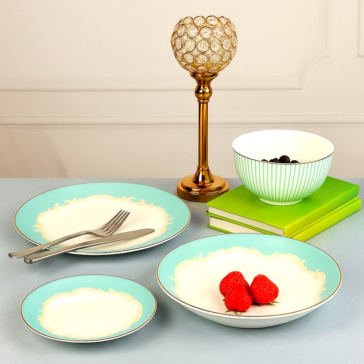 Alba Royal Bone China Dinner Set – 16 and 24 piece plates and bowls with elegant turquoise and cream design, styled with strawberries and a gold candle holder